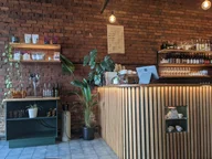 Sleepy's Cafe and Wine Bar logo