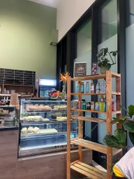 AlkiraBiz Cafe logo