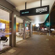 Stone Real Estate Manly logo