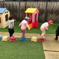 Little Feet Big Steps Day Care logo