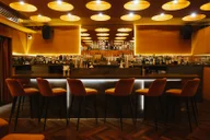 Naked & Famous Bar logo