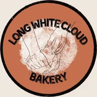 Long White Cloud Bakery logo