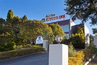 Alpine Motor Inn logo