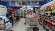 Wembley Milk Bar & Tatts Lotto logo