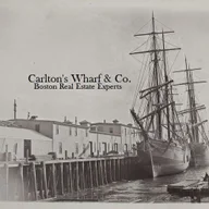 Carlton's Wharf & Co. Real Estate logo