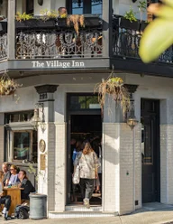 The Village Inn Paddington logo