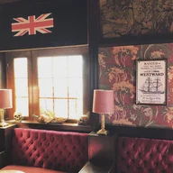 Smuggler's Pub logo