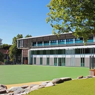 The American School in London logo