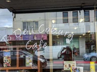 The Deli Coburg logo