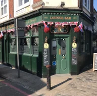 The Manor Arms logo
