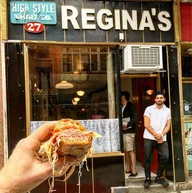 Regina's Grocery logo