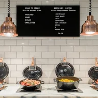 Home Kitchen and Bar logo