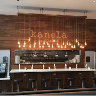 Kanela Breakfast Club logo