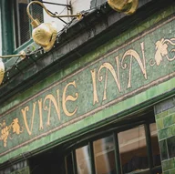 The Vine Inn logo