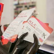 H.L.U Hair Nail and Beauty Salon logo