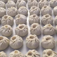 Mister Momo Dumplings logo