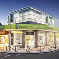 Mancini Real Estate logo