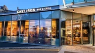 Cast Iron Bar and Grill logo