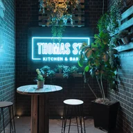 Thomas St Kitchen and Bar logo