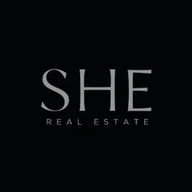 SHE Real Estate logo