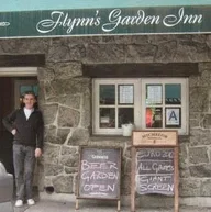 Flynn's Garden Inn logo